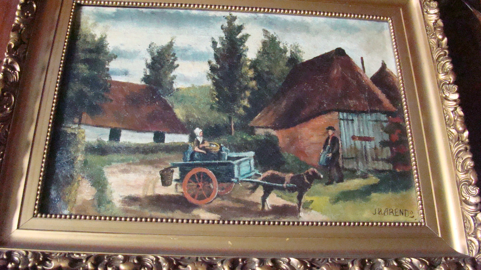 Schilderij boerderij met trekhondenkar.