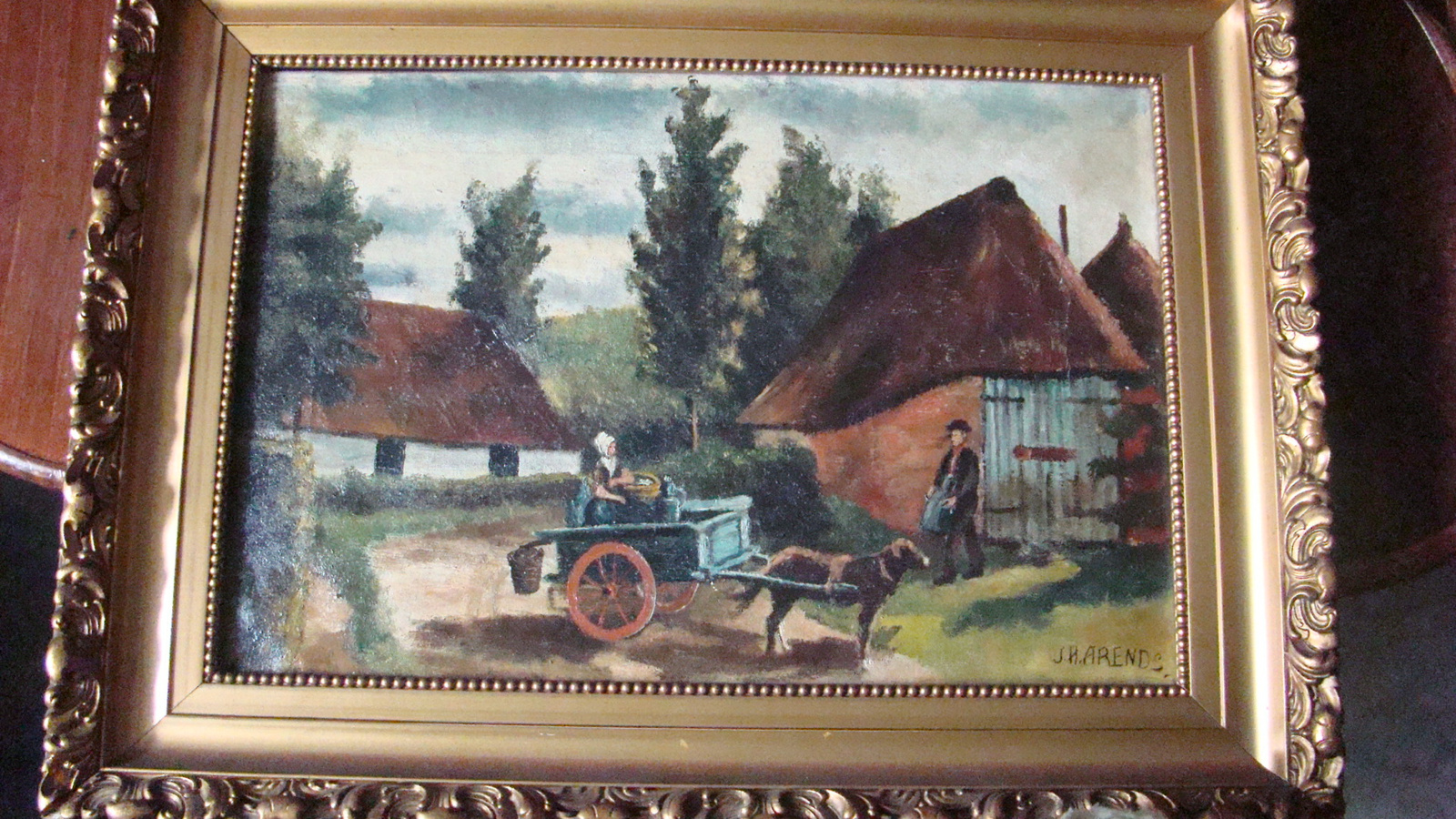 Schilderij boerderij met trekhondenkar.