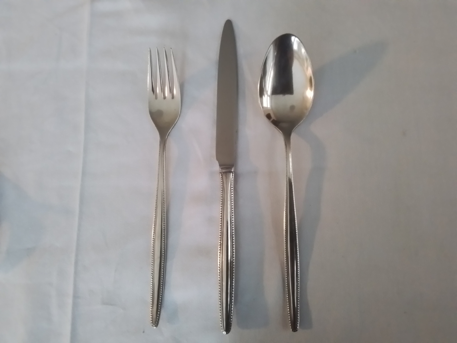Vork,mes en lepel parelrand Gero 100