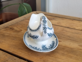 Société Céramique Bruges blauw sauskom op vaste onderschotel