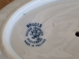 Société Céramique Bruges blauw sauskom op vaste onderschotel