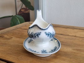 Société Céramique Bruges blauw sauskom op vaste onderschotel